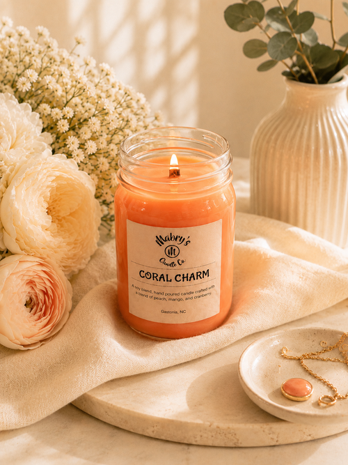 Product photo of a 12 oz canning jar candle in Coral Charm scent