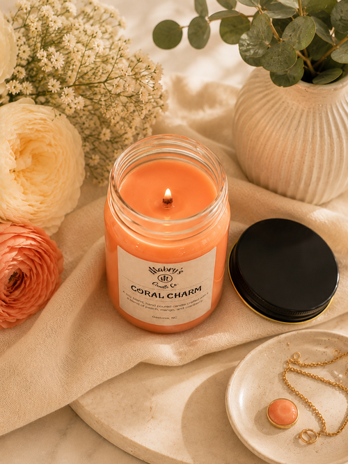 Product photo of a 12 oz canning jar candle in Coral Charm scent
