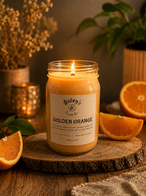 Product photo of a 12 oz canning jar candle in Golden Orange scent