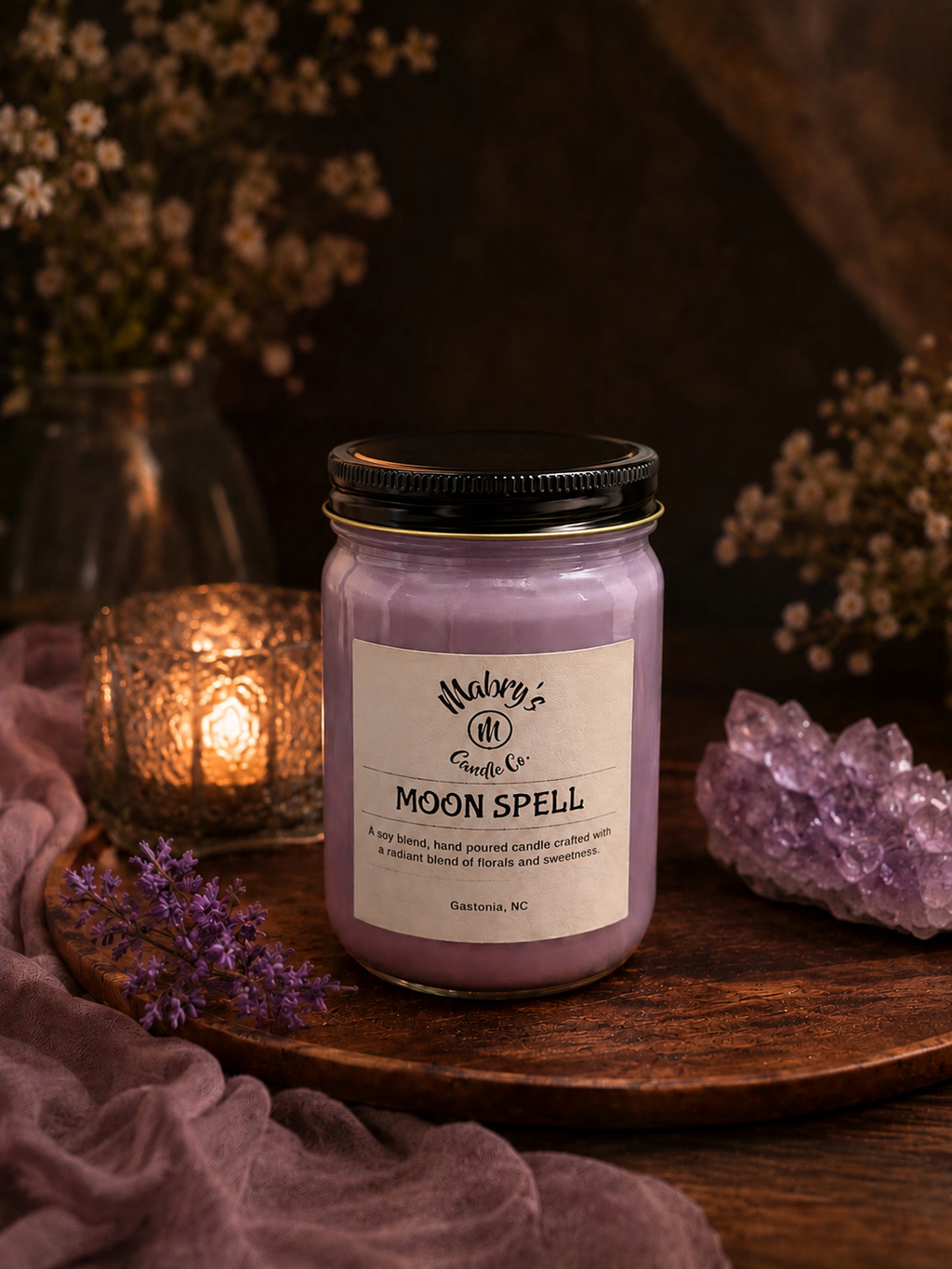 Product photo of a 12 oz canning jar candle in Moon Spell scent